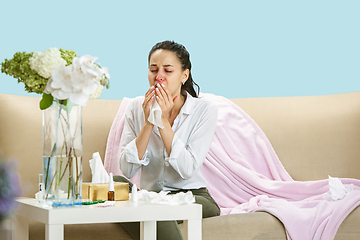 Image showing Young woman suffering from hausehold dust or seasonal allergy.