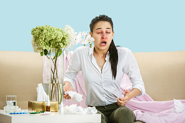 Image showing Young woman suffering from hausehold dust or seasonal allergy.