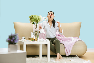 Image showing Young woman suffering from hausehold dust or seasonal allergy.