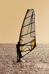 Image showing Silhouette of a windsurfer on waves 