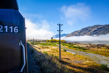 Image showing Train in Mountain fields landscape, New Zealand