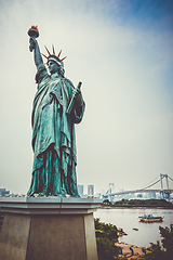 Image showing Statue of liberty and tokyo cityscape, Japan