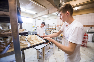 Image showing bakers preparing the dough