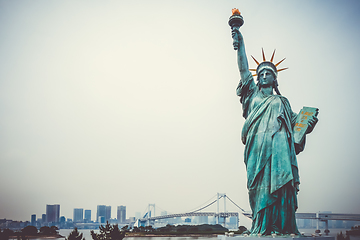 Image showing Statue of liberty and tokyo cityscape, Japan