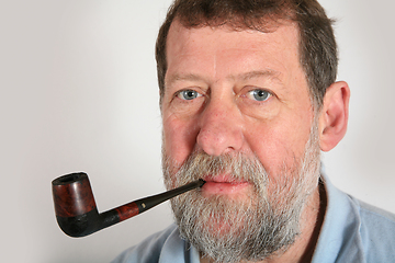 Image showing Mature scandinavian man smoking  pipe