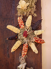 Image showing Vintage corn decoration on a door