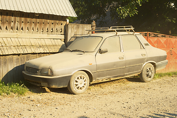 Image showing Car covered dust street Romania