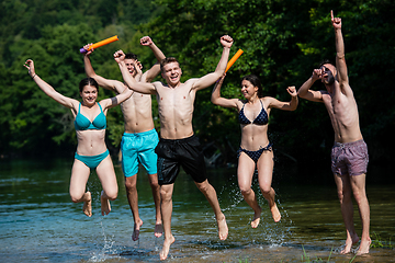 Image showing summer joy friends having fun on river