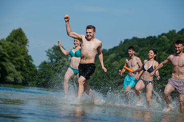 Image showing summer joy friends having fun on river