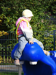 Image showing Child plays on playground