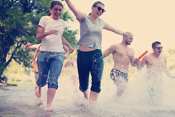 Image showing summer joy friends having fun on river