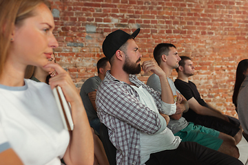 Image showing Students listening to presentation in hall at university workshop