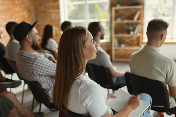 Image showing Students listening to presentation in hall at university workshop