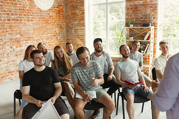 Image showing Students listening to presentation in hall at university workshop