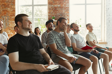 Image showing Students listening to presentation in hall at university workshop