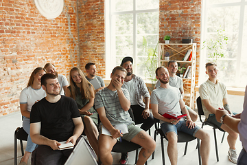 Image showing Students listening to presentation in hall at university workshop