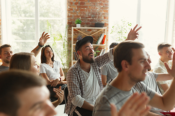 Image showing Male speaker giving presentation in hall at university workshop