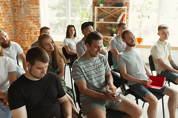 Image showing Students listening to presentation in hall at university workshop