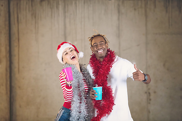 Image showing young multiethnic business couple celebrating new year party