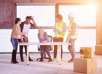 Image showing group of multiethnic business people on construction site