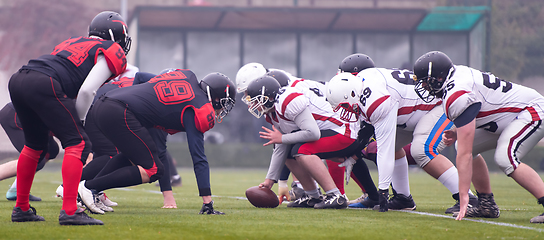 Image showing professional american football players ready to start