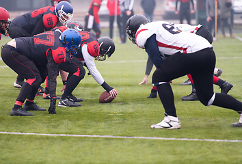 Image showing professional american football players ready to start