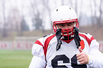 Image showing portrait of young confident American football player