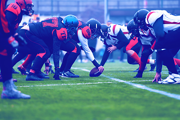 Image showing professional american football players ready to start