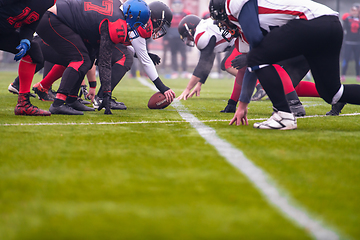 Image showing professional american football players ready to start