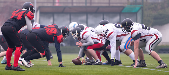 Image showing professional american football players ready to start