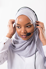 Image showing african customer representative business woman with phone headse