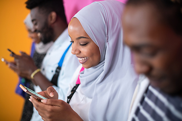 Image showing african students group using smart phones