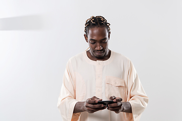 Image showing african man using smartphone