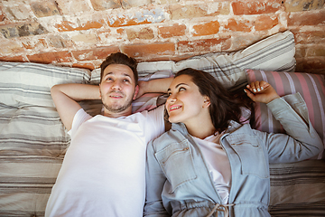 Image showing Young couple moved to a new house or apartment