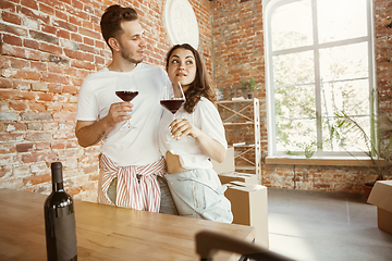 Image showing Young couple moved to a new house or apartment