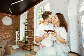 Image showing Young couple moved to a new house or apartment