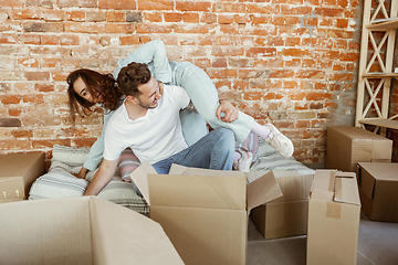 Image showing Young couple moved to a new house or apartment