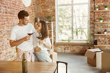 Image showing Young couple moved to a new house or apartment