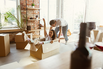 Image showing Young couple moved to a new house or apartment