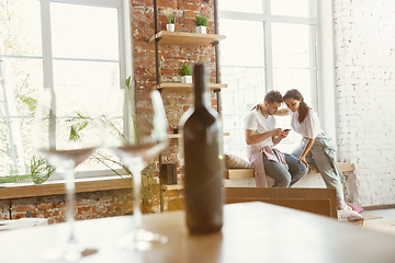 Image showing Young couple moved to a new house or apartment