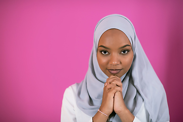 Image showing African Muslim woman makes traditional prayer to God