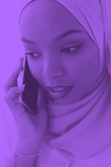 Image showing african business woman using smartphone