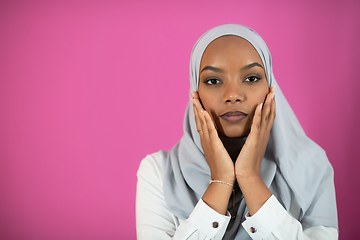 Image showing African Muslim woman makes traditional prayer to God