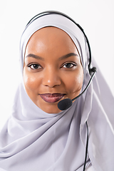 Image showing african customer representative business woman with phone headse