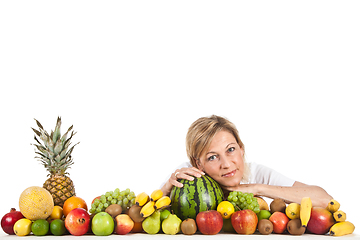 Image showing Fruits and blond cute woman