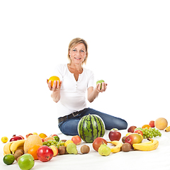 Image showing Fruits and blond cute woman