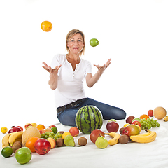 Image showing Fruits and blond cute woman