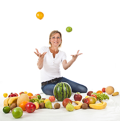 Image showing Fruits and blond cute woman