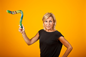 Image showing woman posing with a boomerang