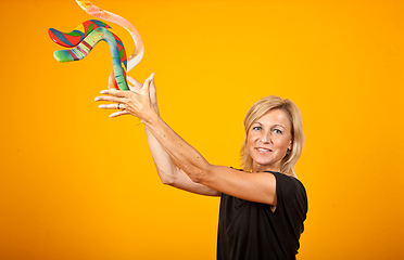 Image showing woman posing with a boomerang